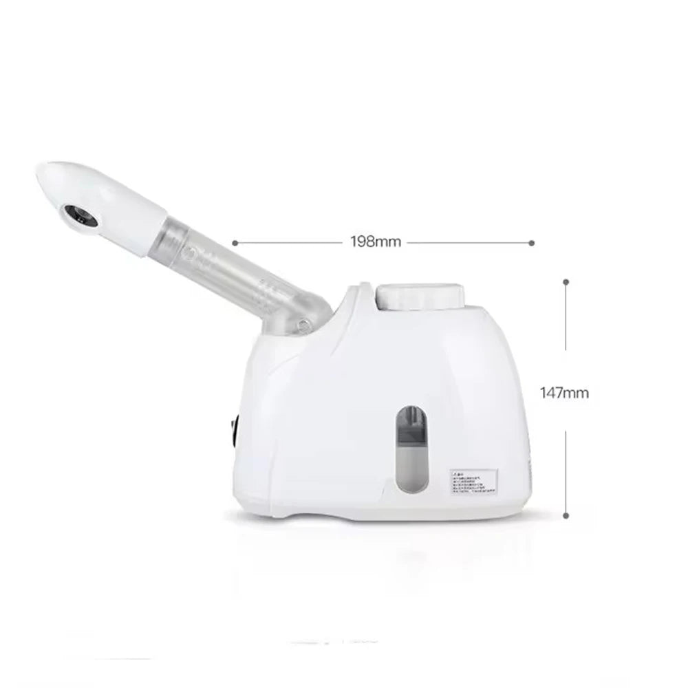 Portable white facial steamer machine with ozone spray nozzle and water tank for home skincare and spa treatment.