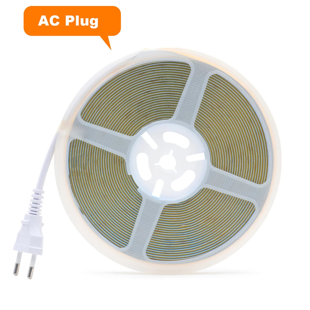 COB LED strip reel with AC plug and flexible LED tape on a white spool