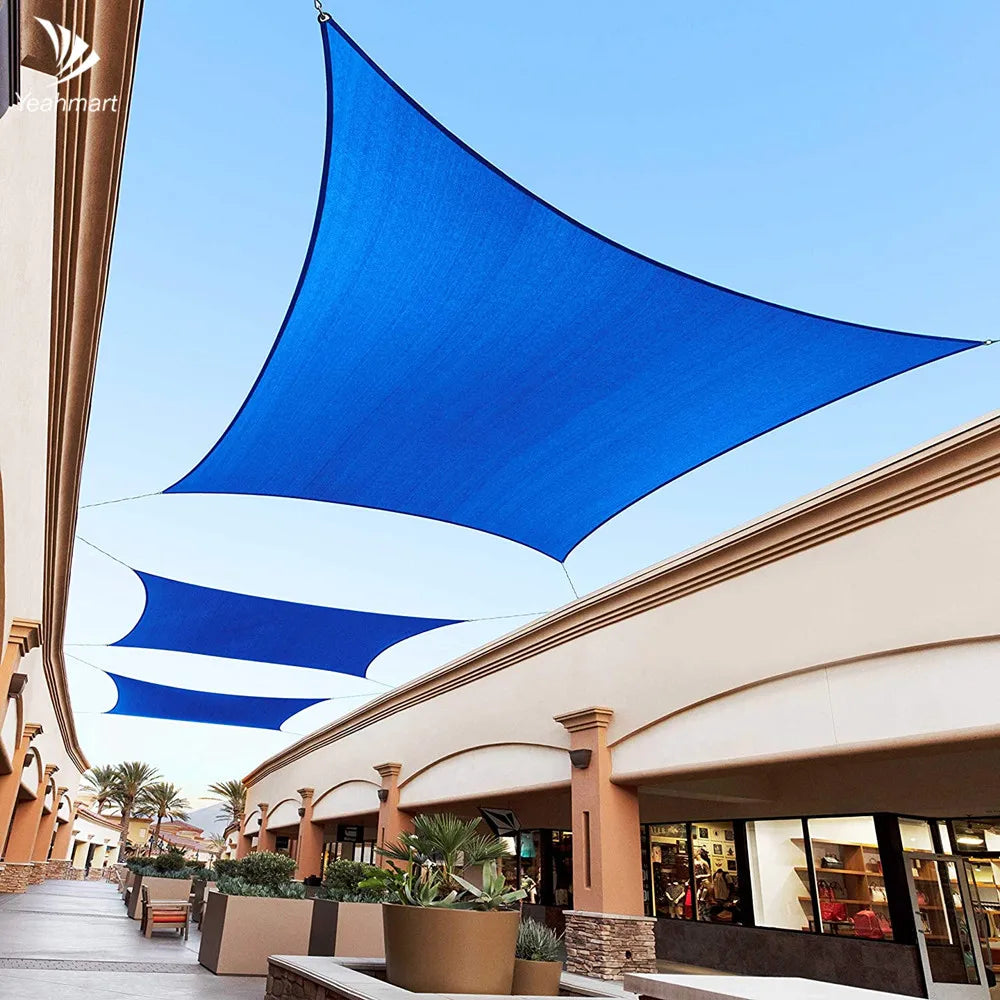 Blue waterproof sail shade canopy with curved edges and corner hanging points