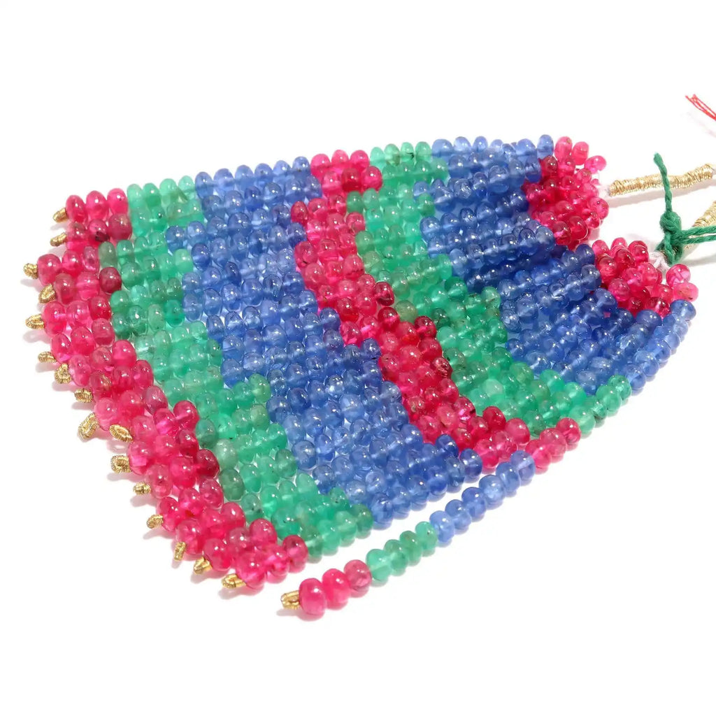 Multicolor 4mm smooth rondelle bead strand in blue, green, and pink with gold end caps.