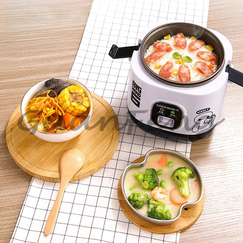 Portable mini rice cooker on counter, cooking pot with meal and serving dishes