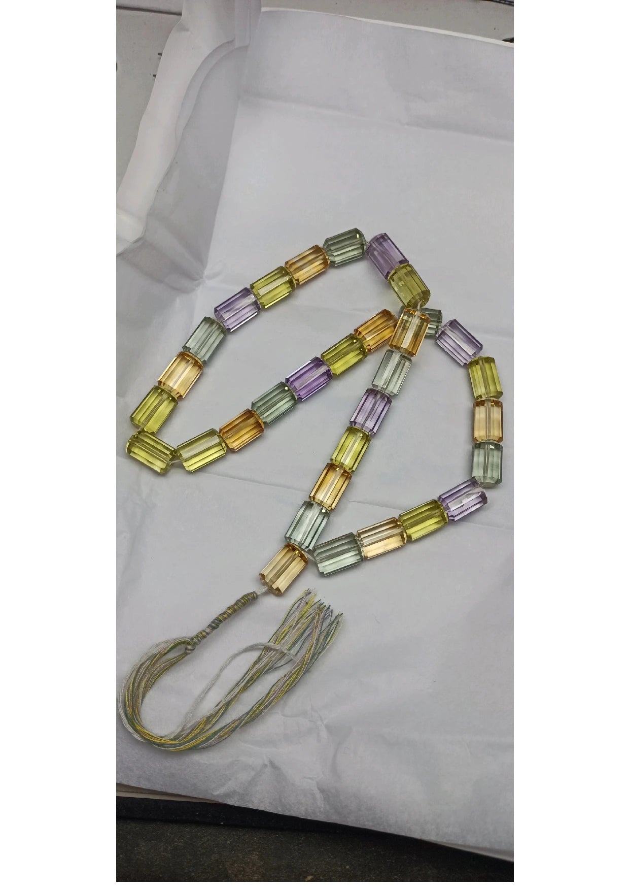 16-inch strand of faceted cylinder beads, multicolor yellow, purple, green, and clear