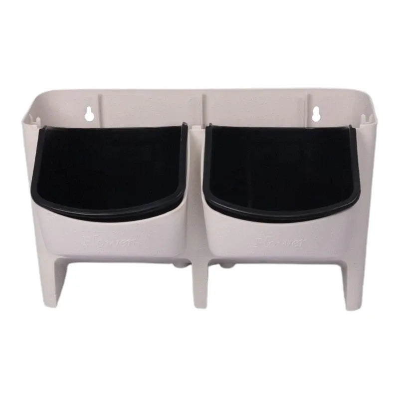 White double-pocket hanging wall planter with two black cup inserts.