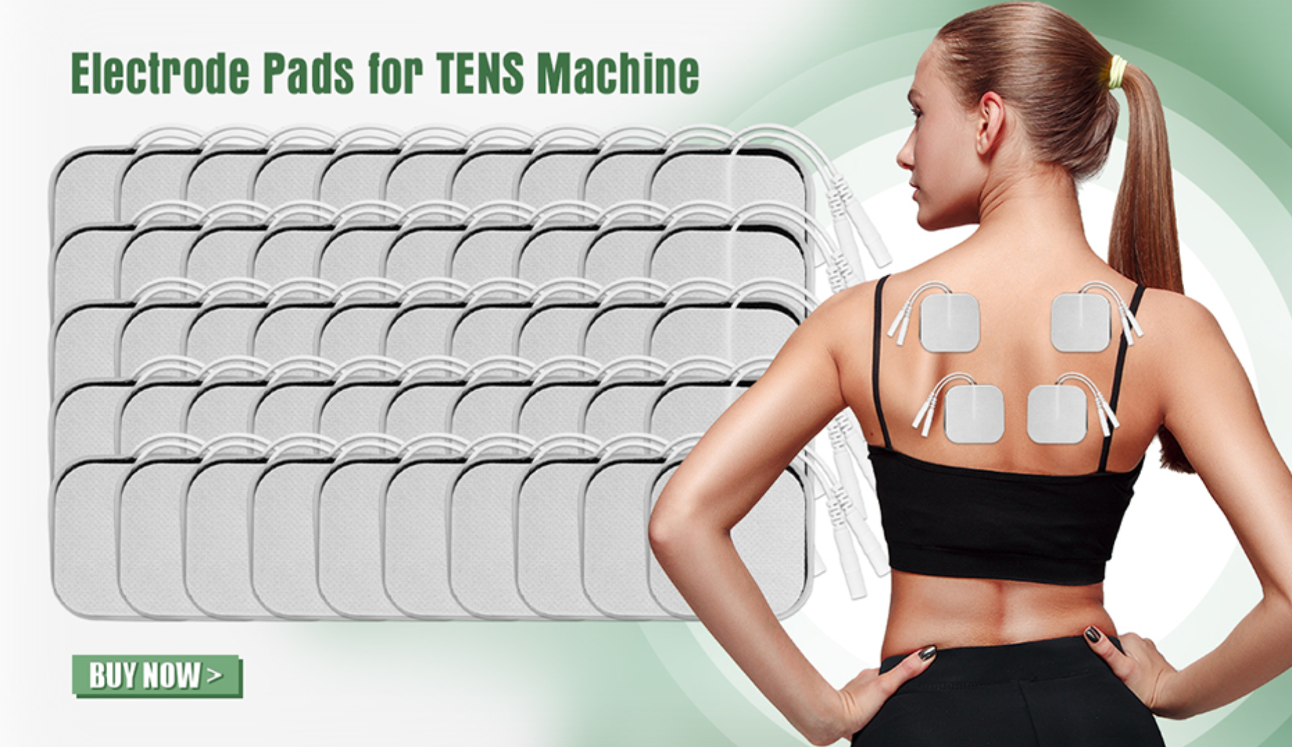 Set of white square electrode pads for TENS unit pain relief massage therapy on woman's back.
