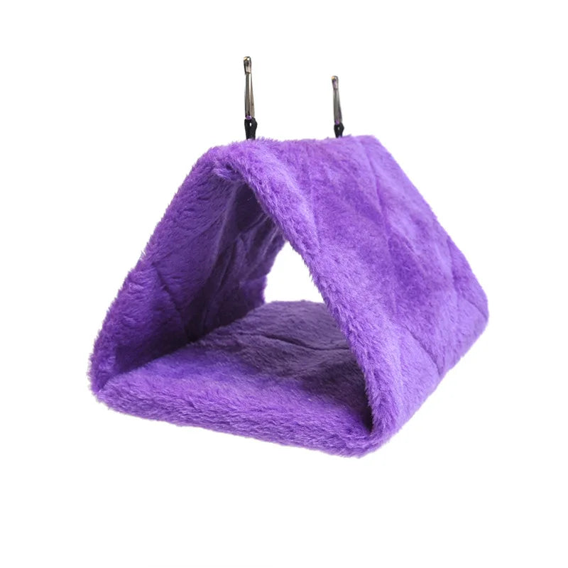 Soft purple plush hanging hammock bed for hamsters, birds, and small pets to provide a warm, cozy winter sleeping nest.