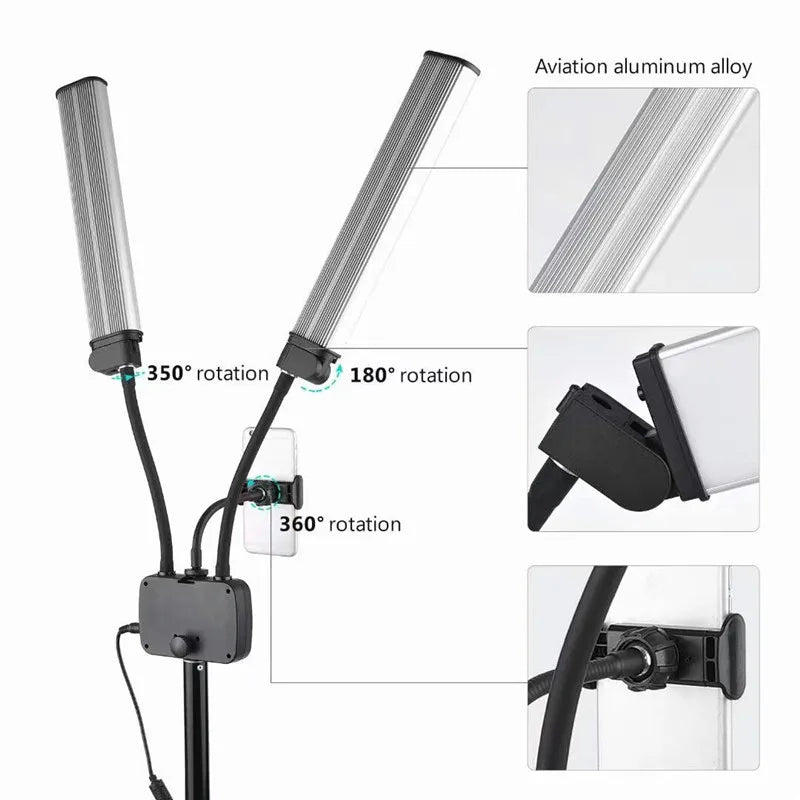 Dual-arm aluminum alloy LED video light with adjustable rotation and a center phone holder for photography.
