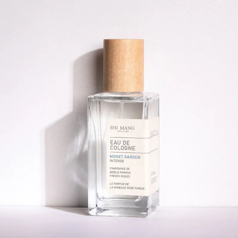 Shi Mang Monet Garden Rose Eau de Cologne, 50ml glass bottle with wooden cap. Long-lasting floral scent for women.