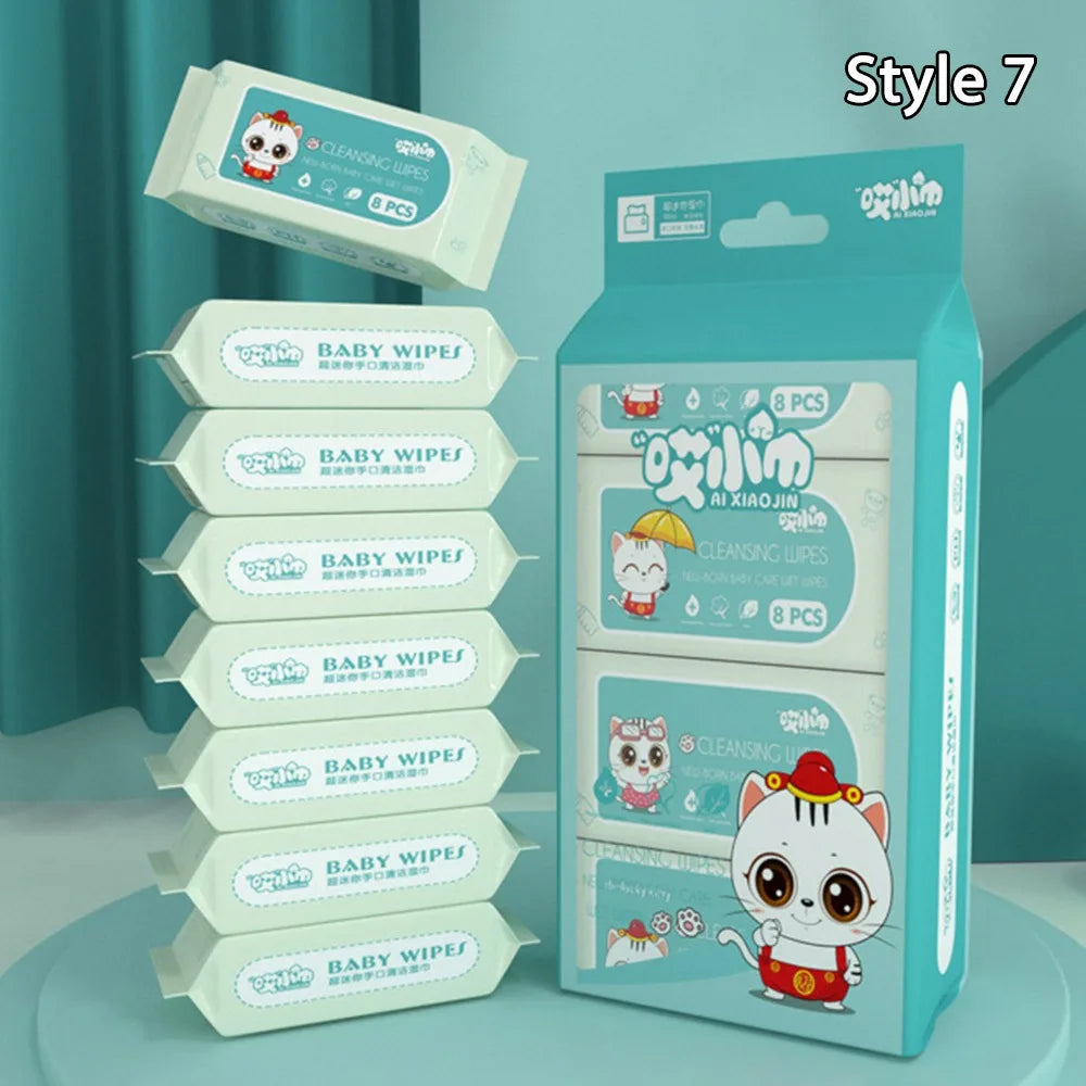 Ai Xiaojin baby care cleansing wipes, 8-count packs with cute cartoon cat design, gentle wet wipes for newborns.