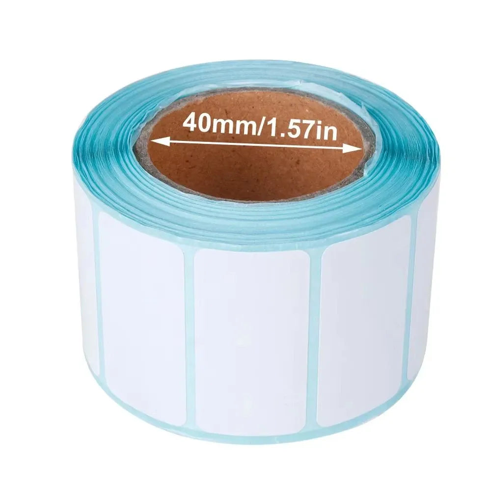 Thermal label sticker roll close-up with white label squares and teal border; approx 40 mm