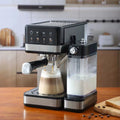 Black and stainless steel espresso machine with integrated milk frother, digital touch display, and glass cup.