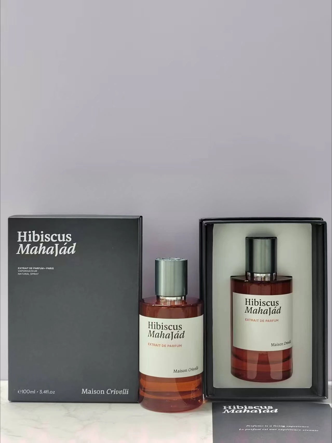Maison Crivelli Hibiscus Mahajád Extrait de Parfum: unisex 100ml amber bottle luxury fragrance in elegant display box.