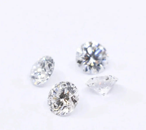 Round brilliant lab-grown diamonds, four white stones with bright faceting