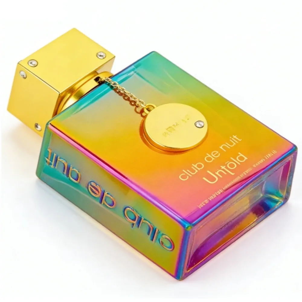 Armaf Club de Nuit Untold 105ml EDP: Iridescent rectangular unisex perfume bottle with gold cap and charm. Seductive.
