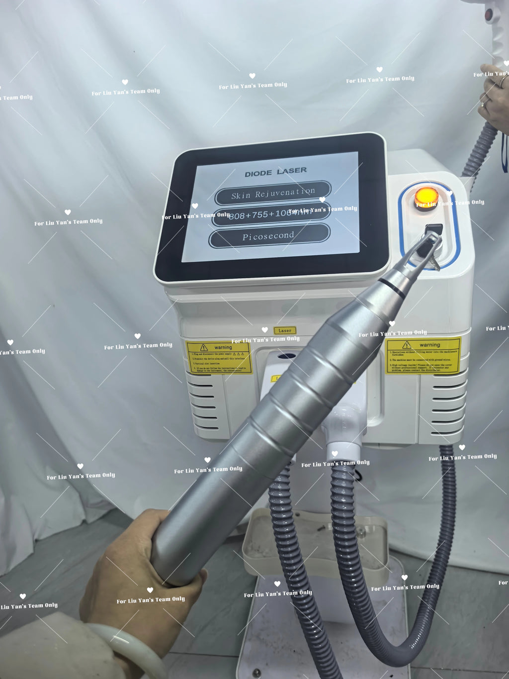 Tidesmit 2-in-1 Diode and Picosecond laser device showing laser heads for professional hair and tattoo removal.