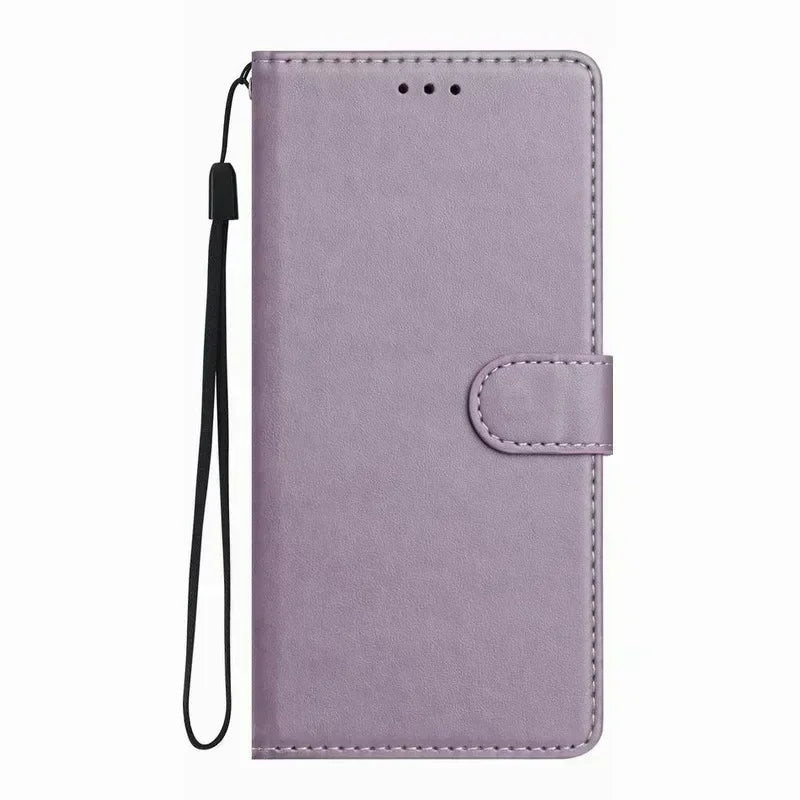 Lavender faux leather wallet phone case with a magnetic strap and detachable black wrist strap.