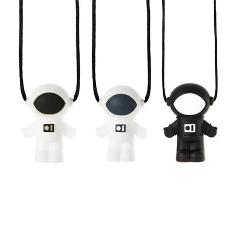 Black and white silicone astronaut baby teething toys for soothing relief.