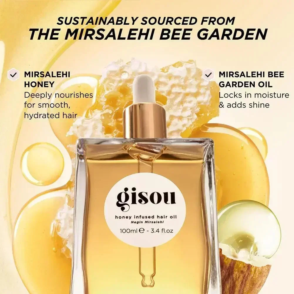 Gisou Honey Infused Hair Oil in a glass dropper bottle featuring golden honey texture and floral bee garden branding.