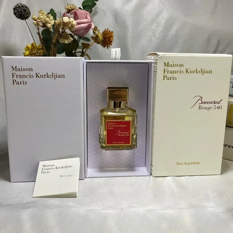 Maison Francis Kurkdjian Baccarat Rouge 540 EDP 70ml. Square glass bottle, unisex luxury spray, iconic red label scent.