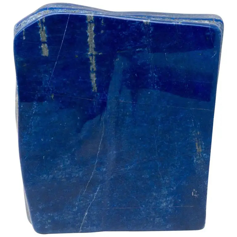 Polished blue lapis lazuli block tumble with square edges and natural veining